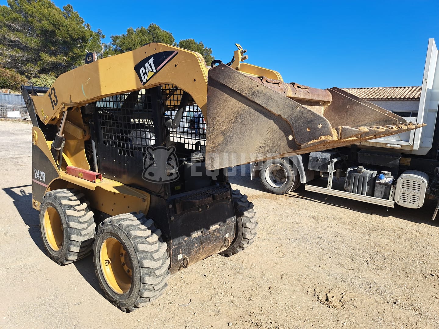 242b Caterpillar 242B Used Wheeled Skid Steer for Sale | Equippo
