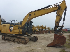Caterpillar 330 FLN con acoplador rápido Oilquick OQ-80 y cubo - - Excavadora de cadenas Usada