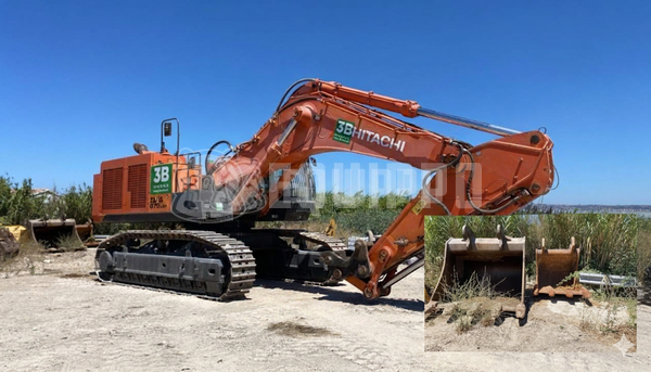 Bild des Hitachi ZX870-5G mit Schnellwechsler und 2 Löffeln