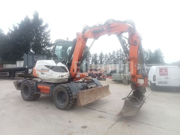Picture of the Mecalac 9MWR with 3 excavator buckets