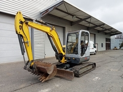Wacker Neuson 50Z3 z 3 łyżkami koparki - Left Front in Polish translates to "Lewy Przód". - Używany Mini koparka < 7t