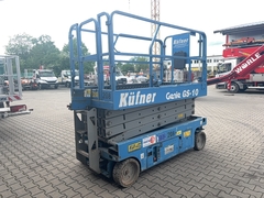 Genie GS-2646 - Links voor - Gebruikte Schaarhoogwerker
